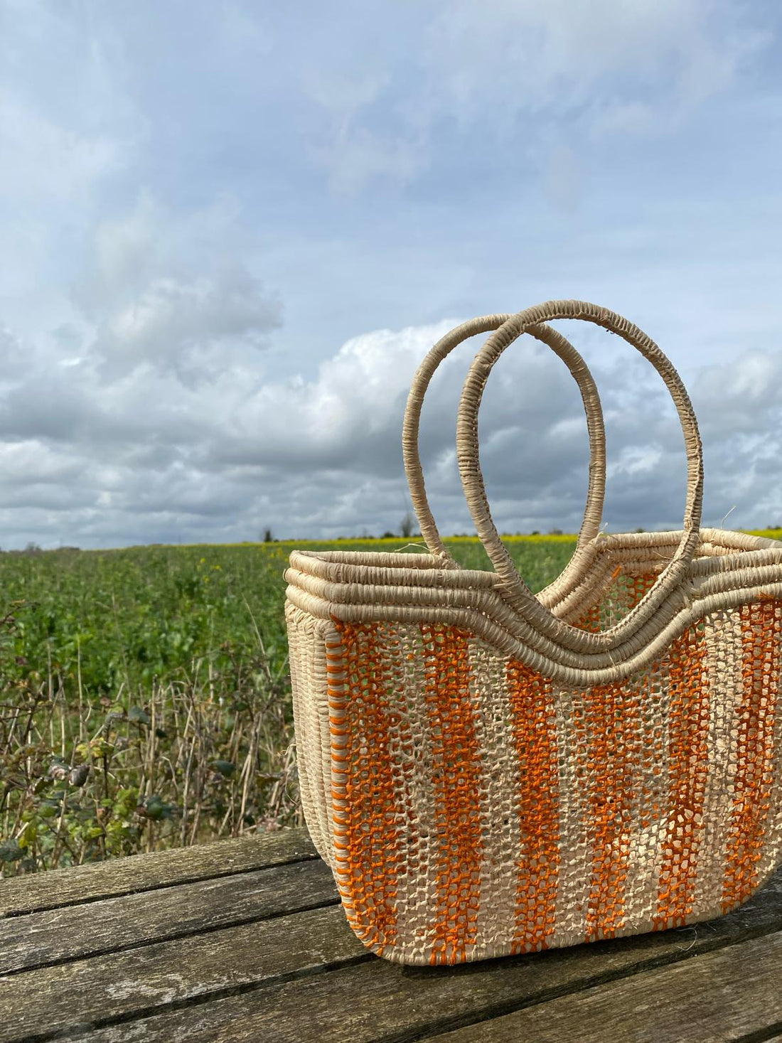 Hand woven raffia basket - orange