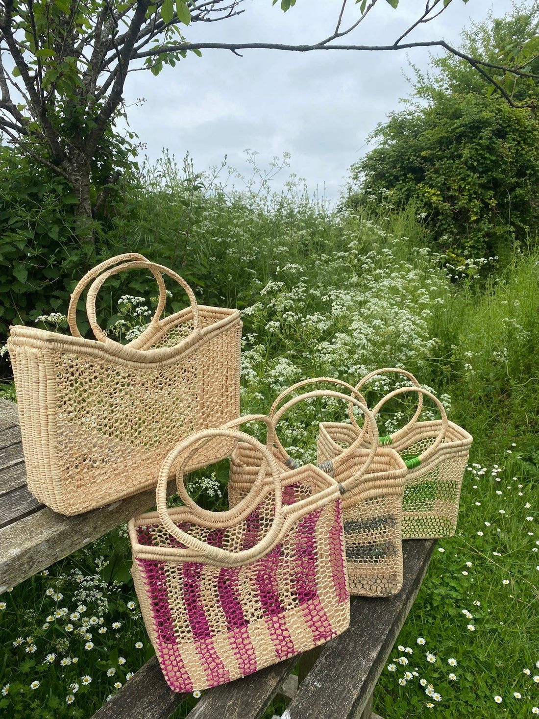 Hand woven raffia basket - green horizontal stripe